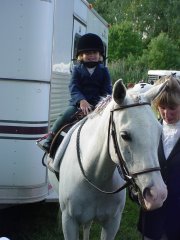 Kayleigh showing the pony "Sandy".  Click to enlarge.