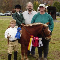 The Sauyet family with pony Pumpkin.  Click to enlarge.